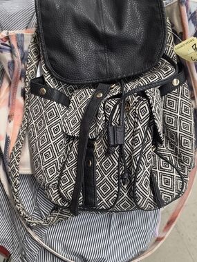 Expressions BrandBlack & Cream Geometric Drawstring Backpack  Faux-Leather Trim